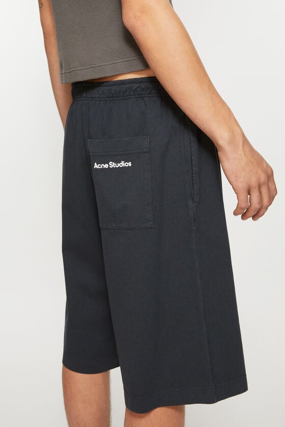Acne Studios Jerseyshorts mit Logo-Stempel Angebote