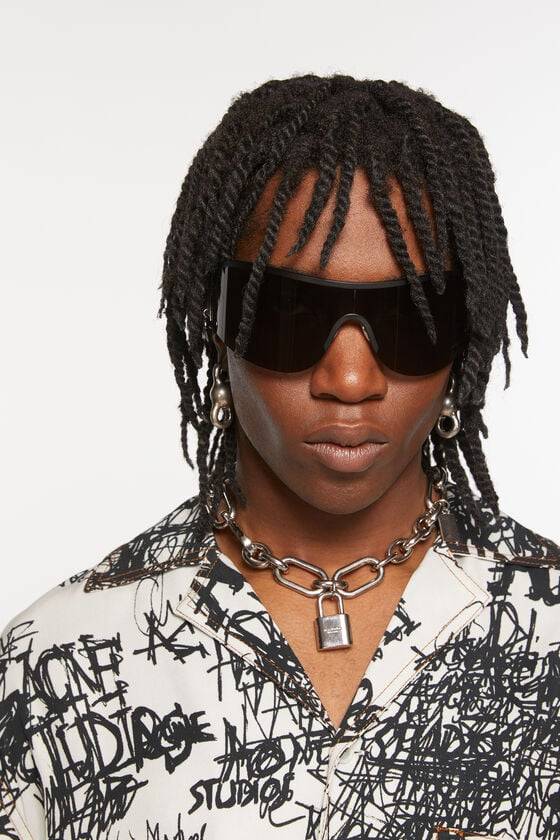 Acne Studios Sonnenbrille mit Metallrahmen Rabatt