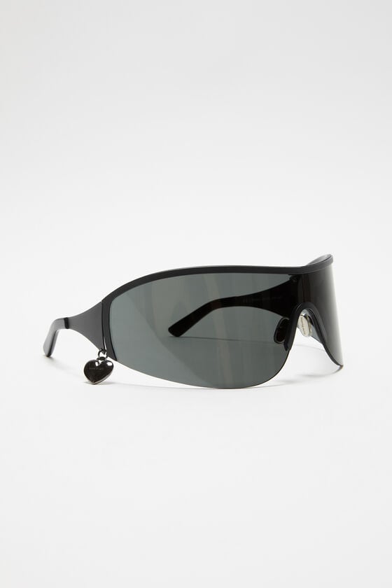 Acne Studios Sonnenbrille mit Metallrahmen Rabatt