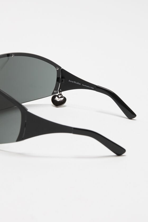 Acne Studios Sonnenbrille mit Metallrahmen Rabatt