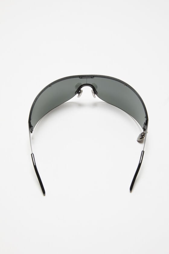 Acne Studios Sonnenbrille mit Metallrahmen Rabatt