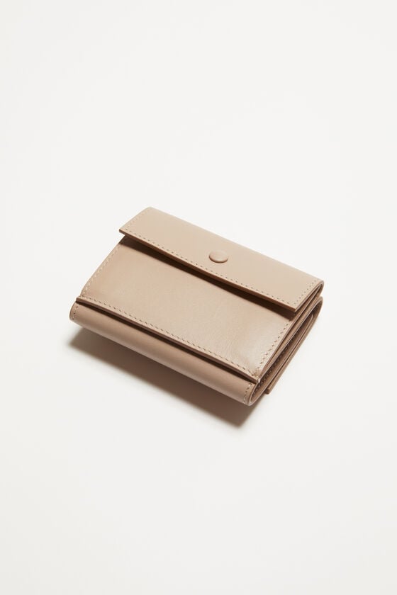 Acne Studios Dreifach-Geldbörse aus Leder Preisnachlass