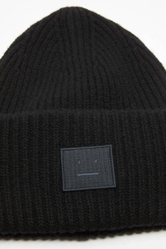Acne Studios Mütze mit großem Face-Logo Bis zu 55% Rabatt