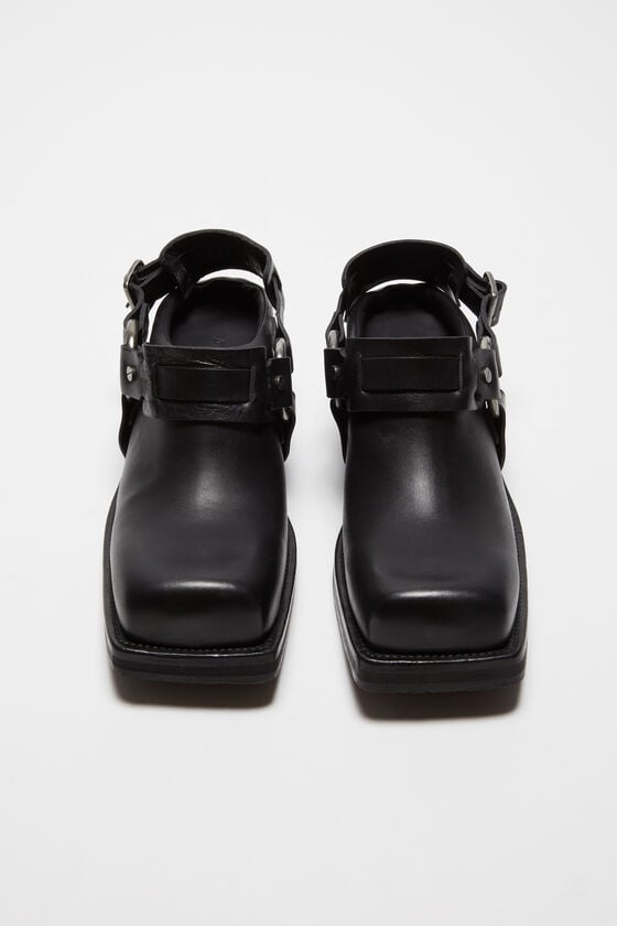 Acne Studios Mules aus Leder mit Schnalle Fabrikladen
