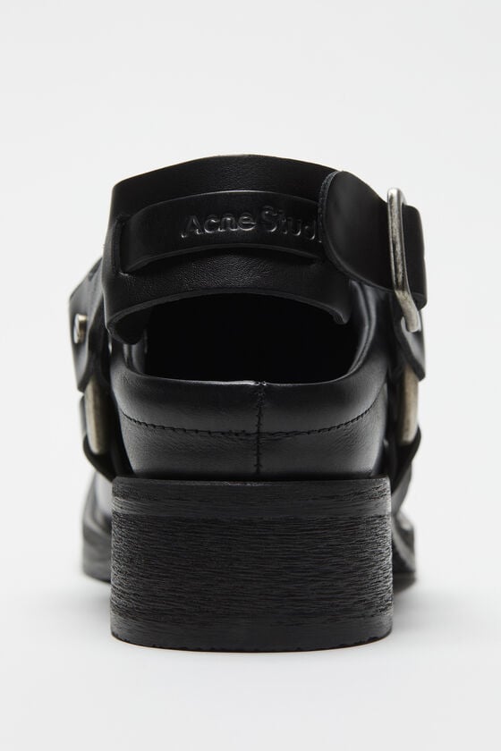 Acne Studios Mules aus Leder mit Schnalle Fabrikladen