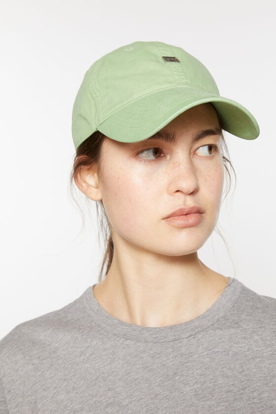Acne Studios Aufgesetzte Kappe mit Face-Logo Auslauf